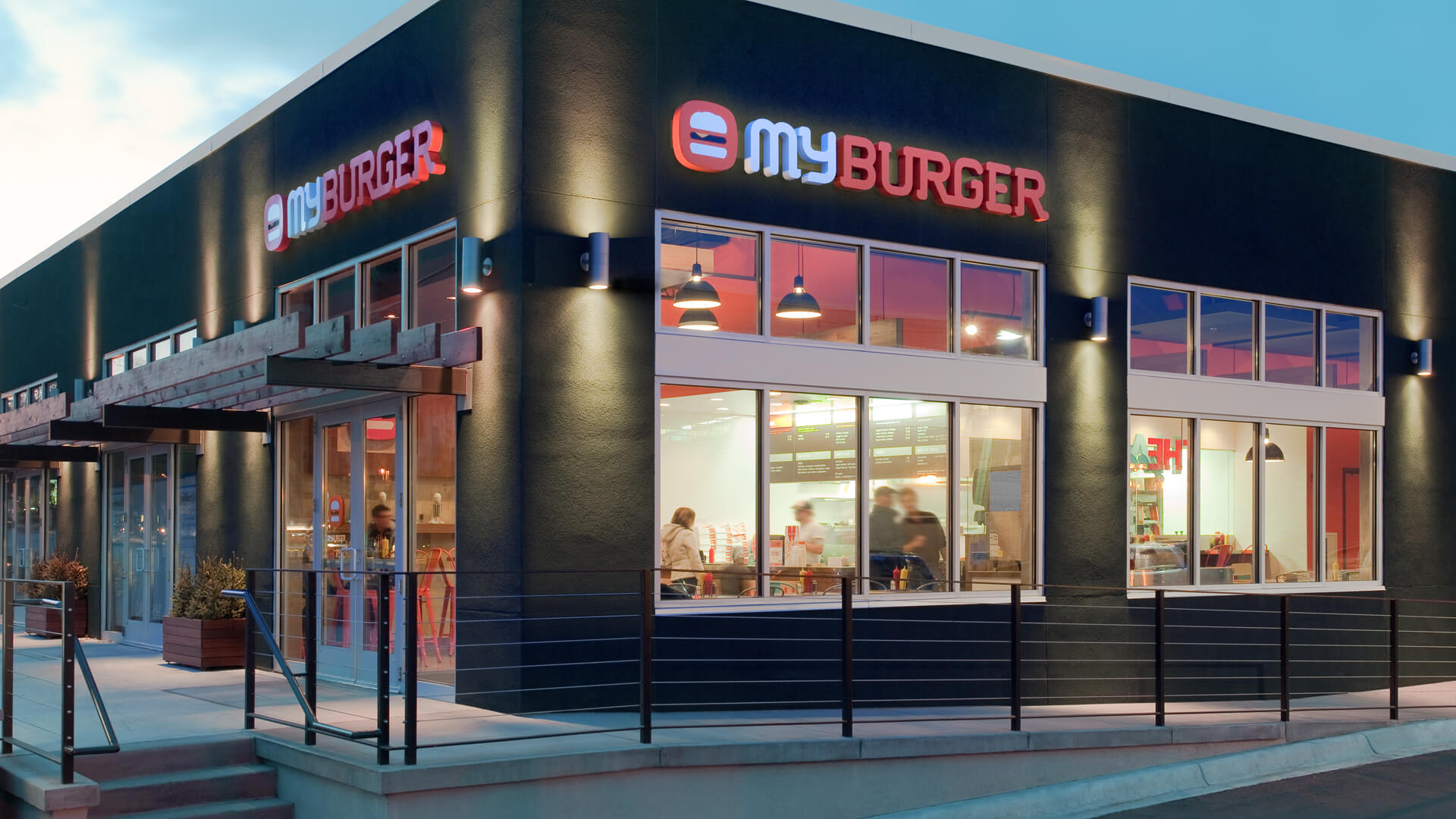 A wide angle shot of the MyBurger exterior storefront.