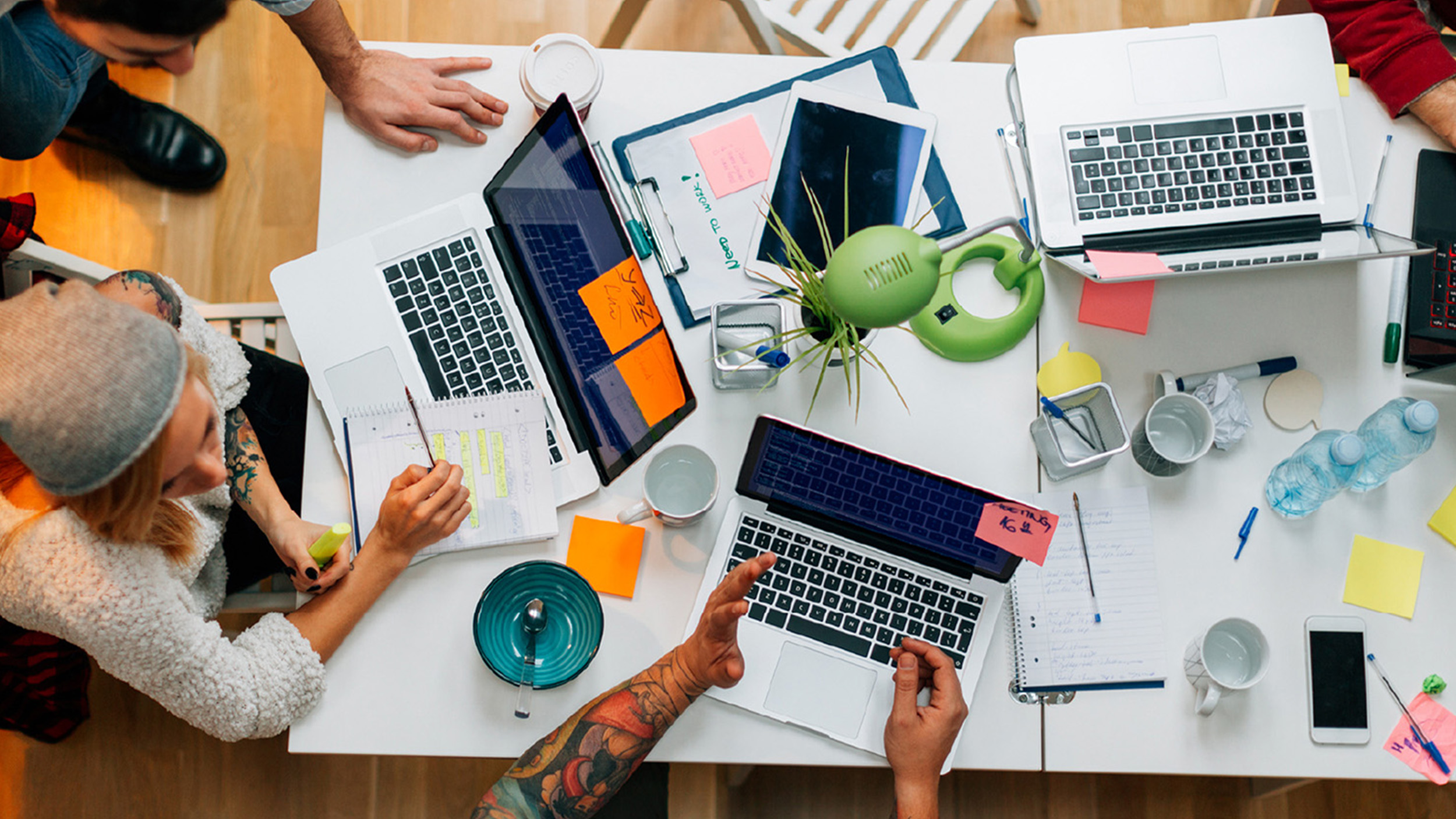 Top view of people collaborating at work