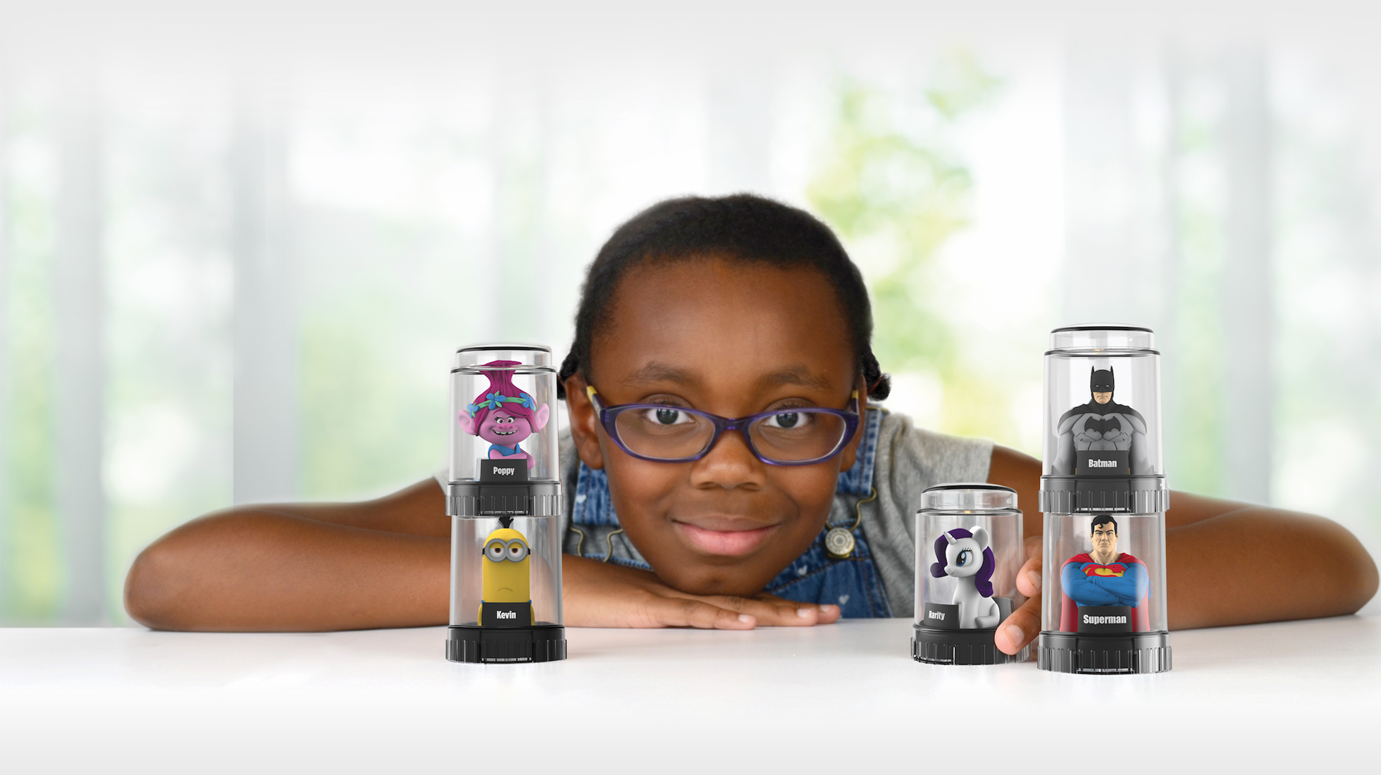 good2grow kid with Despicable Me minion and Superman and Batman and My Little Pony